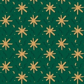 gold christmas stars on green festive holidays