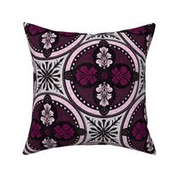 Arabesque half drop circles with leaves and radiating mandalas in burgundy, nearly white and pale pink  hues with a crackled porcelain texture 12” repeat four directional