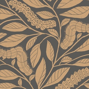 Block print flax yellow caterpillars and leaves on a charcoal gray background. Large