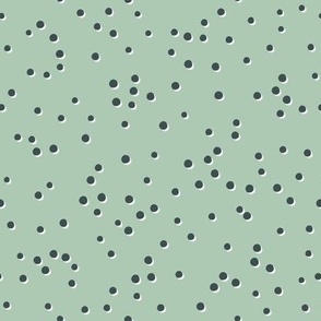 Tossed dark green swiss dots on sage green, 1/4 inch dots