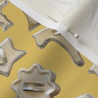 Metal Cookie Cutters on Yellow