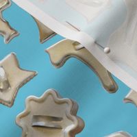 Metal Cookie Cutters on Turquoise Blue