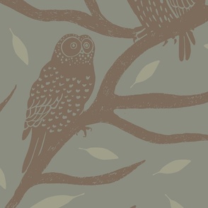 Block print pattern of owls branches and leaves on a winter blue background. (Large)