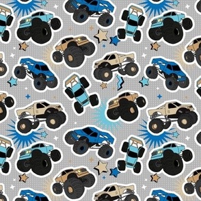 Cool toy monster trucks with stars and lightning comic detailing boys cars design aqua blue beige sand on soft gray