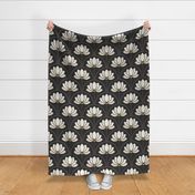 Large scale / Beige art deco lotus flowers on black / monochromatic light creamy off white ivory tan water lilies florals with yellow on dark moody mid mod background / bold modern whimsical blossoms