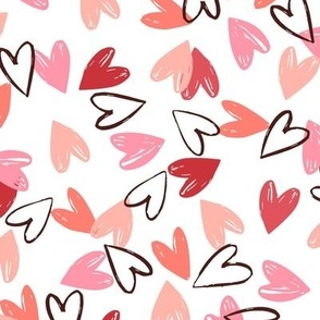 Medium | tossed colorful red and pink hand drawn hearts on white