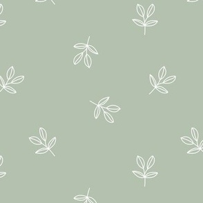 Fresh leaves of spring - minimalist boho style springtime garden in white on sage green