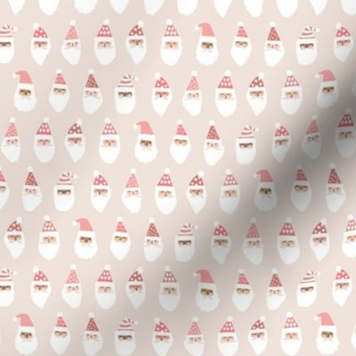 Cheerful Santa Clause Faces on Muted Neutral Pink - 1 inch