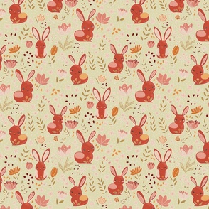 Pink and terracotta red bunnies on a light green background