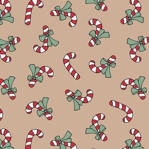 Little candy cane present and bows christmas design red green on tan latte beige vintage palette  