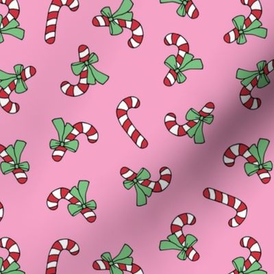 Little candy cane present and bows christmas design red mint green on pink nineties girls palette  