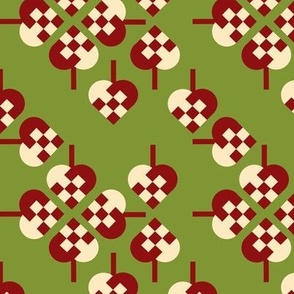 Braided Danish Christmas Hearts on a Green Background