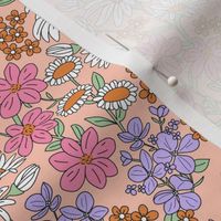 A bouquet of wildflowers - spring garden with poppy flowers coneflower and daisies groovy retro lilac pink orange on blush peach 