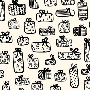 Christmas presents with winter wrapping paper in black and white.