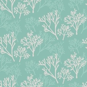 White and teal aqua coral on teal background