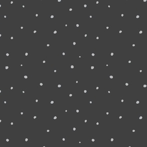 Hand drawn winter snowfall confetti polka dots in dark grey and white