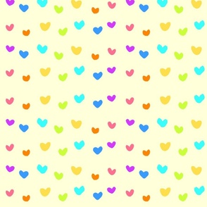 rainbow hearts on pastel yellow