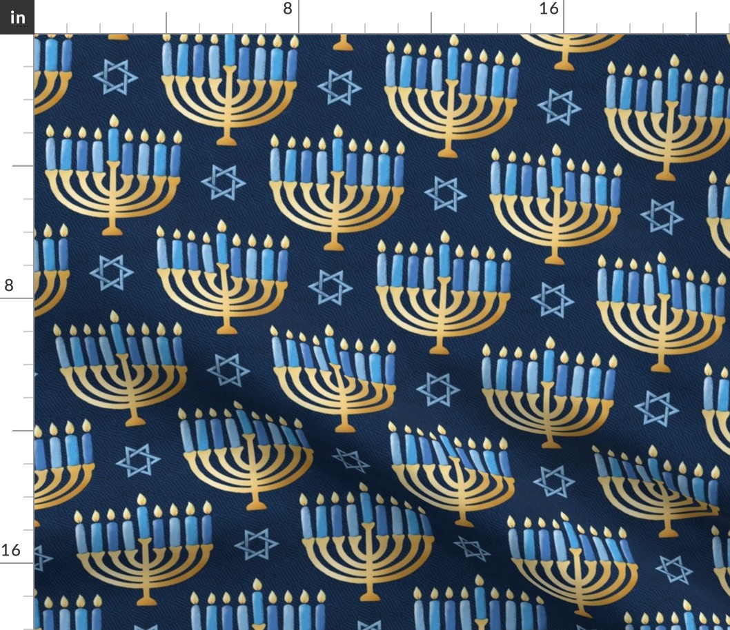 Golden hanukkah menorah with candles on textured deep blue | medium