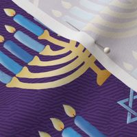 Golden hanukkah menorah with candles on textured purple | medium