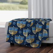 Golden hanukkah menorah with candles on deep blue | large