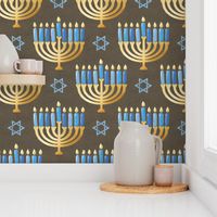 Golden hanukkah menorah with candles on textured brown | large