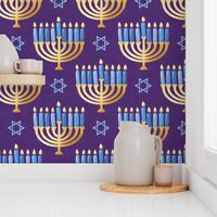 Golden hanukkah menorah with candles on purple | large