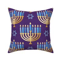 Golden hanukkah menorah with candles on purple | large