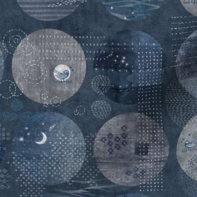 Sashiko Circles with Moons and Stars in Indigo Blue | Japanese stitch patterns on a dark blue linen patchwork, shibori with sashiko stitching, block prints in navy blue and gray.