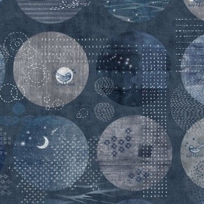 Sashiko Circles with Moons and Stars in Indigo Blue | Japanese stitch patterns on a dark blue linen patchwork, shibori with sashiko stitching, block prints in navy blue and gray.