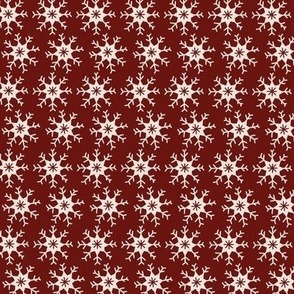 Plain snowflakes on dark red