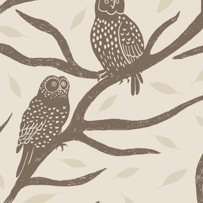Block print pattern of owls branches and leaves on a cream background. (Large)