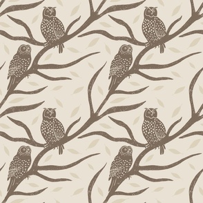 Block print pattern of owls branches and leaves on a cream background. (Medium)