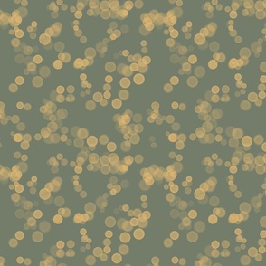 Golden bubbels on green background 