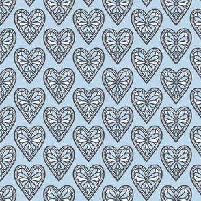 (L) Heartfelt hearts folk art style blue