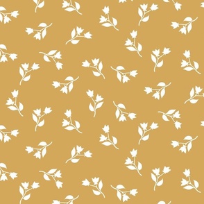 White flowers and ochre color background