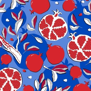 Pomegranate fruits, red fruits on a bright blue background, large scale 