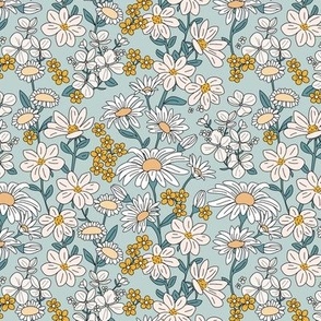 A bouquet of wildflowers - spring garden with poppy flowers coneflower and daisies  retro groovy palette ochre yellow blue mist
