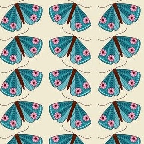 Folky Floral Moths in shades on aqua on cream medium scale fabric