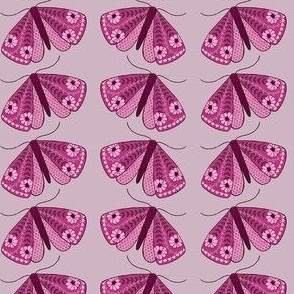 Folky Floral Moths in shades of lilac and magenta medium scale fabric pattern