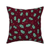 Rustic hand drawn holly design in reds and greens “Holly leaves and berries”