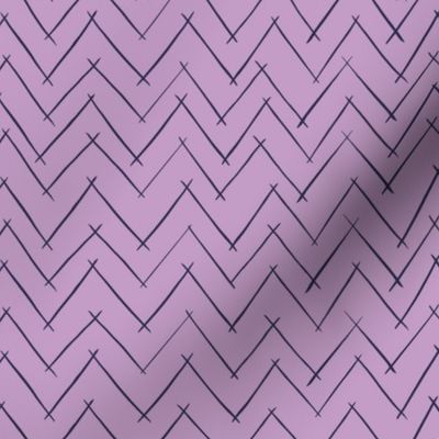 Herringbone style weave using marks in chevrons in pink and dark purple “River Sticks”
