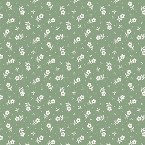 Cute little flowers Vintage Granny Chic non directional pattern for quilting and dressmaking in natural white and mid green