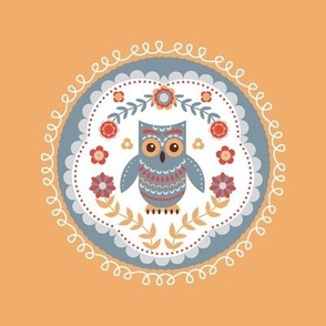   Owl. Round ornament.