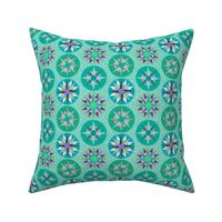 Multicolored Mariner's Compass Quilt Block. Green and Teal. Small Scale