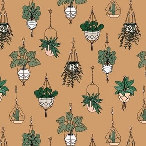 Plant lady Scandinavian hygge style home hanging plants - vintage green on camel ochre