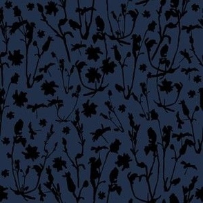 black on dark blue grasses / forest floor