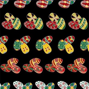 Stripes of Clusters of Colorful Ukrainian Easter Eggs Horizontally Placed on a Black Background