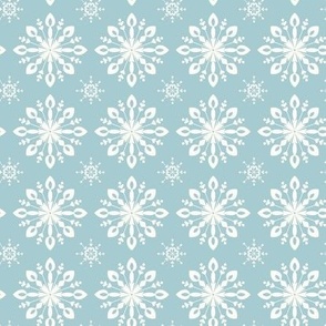 White Snowflakes on a Muted Blue Background