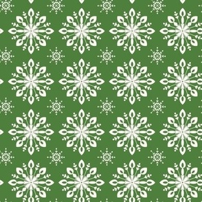 White Snowflakes on a Christmas Green Background