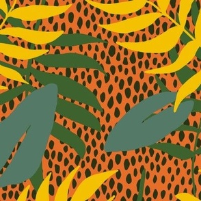 Fun, trendy tropical leaves on dotted orange